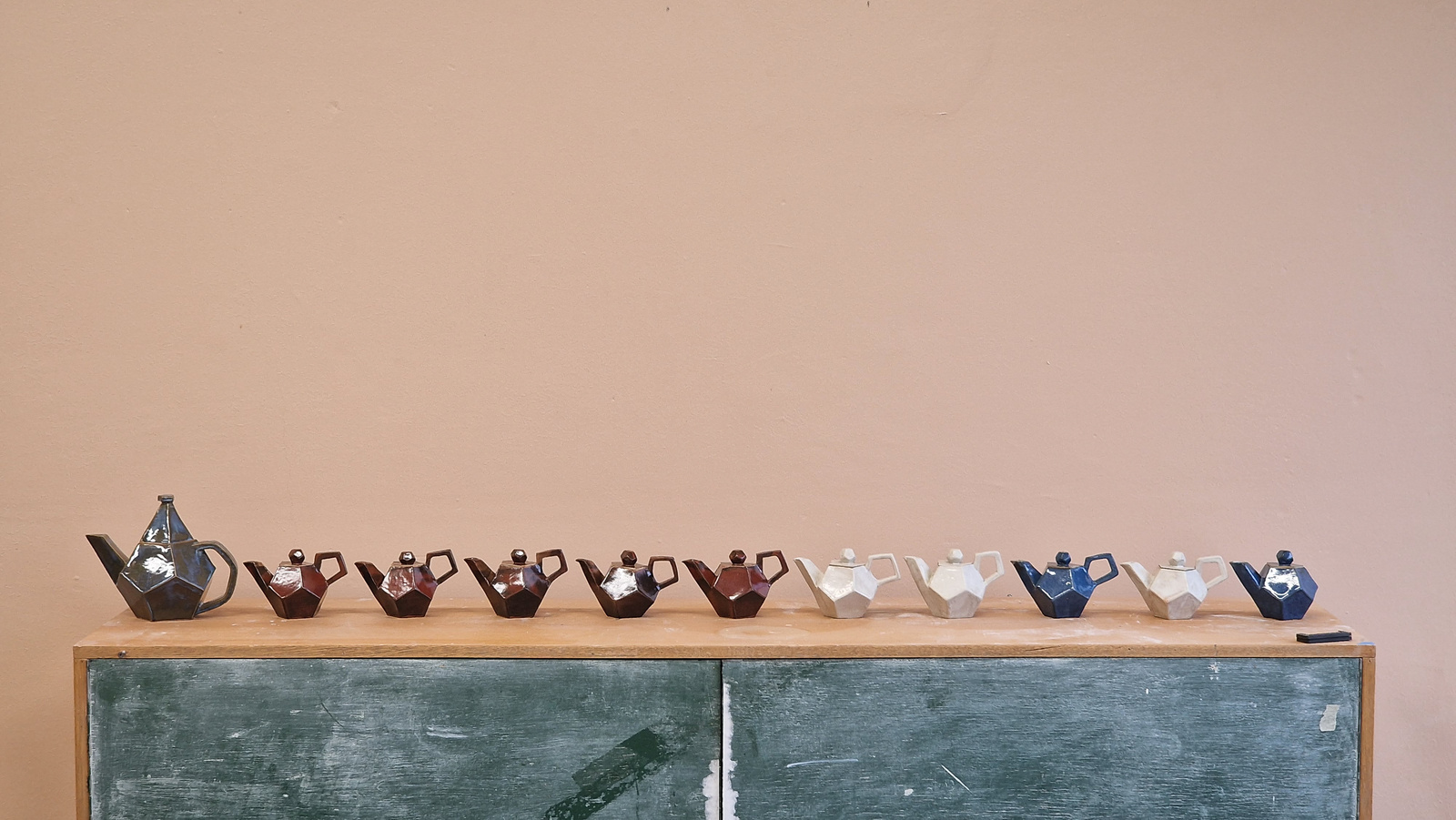 Triin throwing a vessel on the wheel